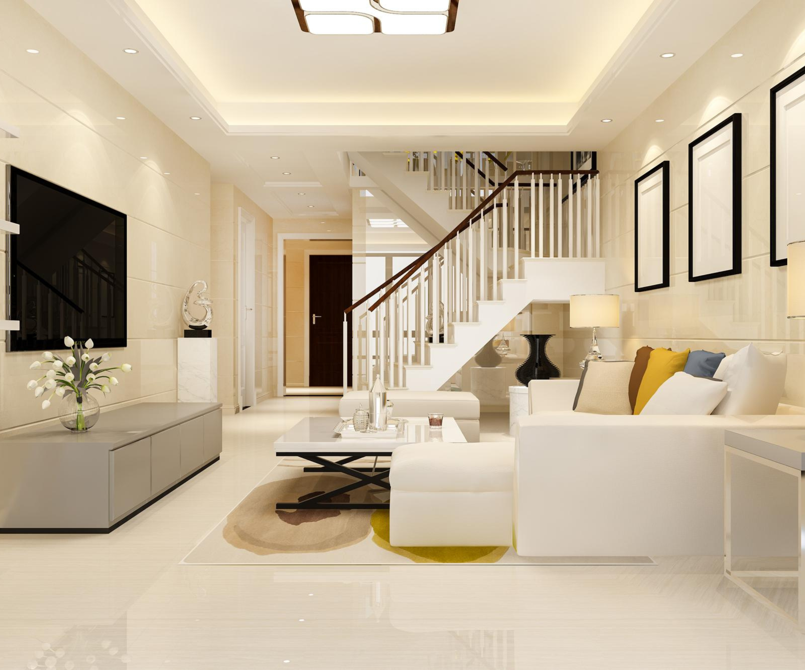 a living room with a staircase and a couch