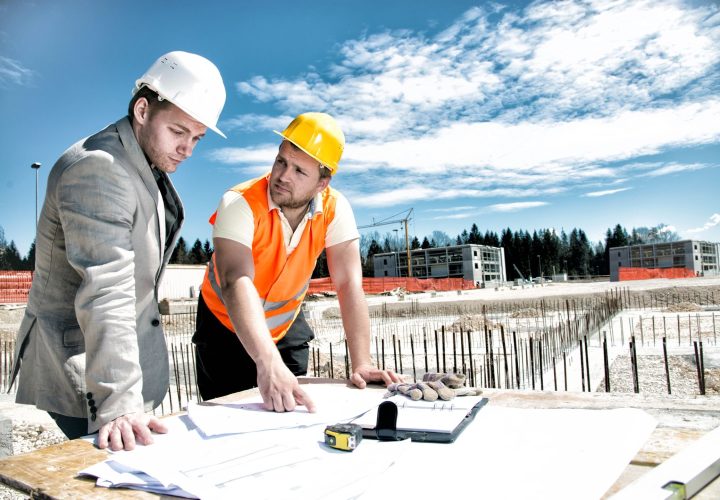 commercial subcontractors consulting with each other